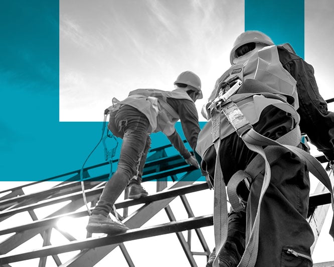 Two men in harnesses climbing scaffolding