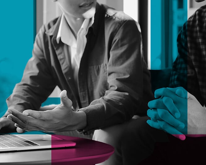 Two people speaking over a laptop