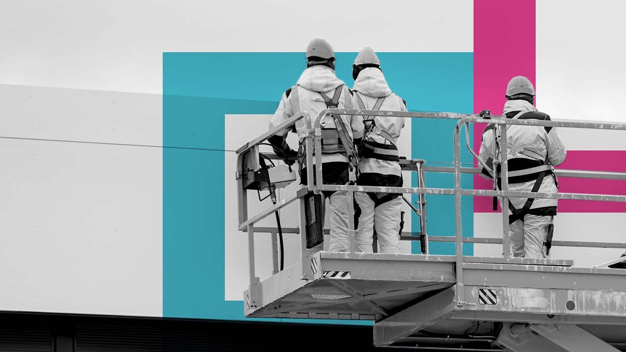 3 men working at heights on a lift truck